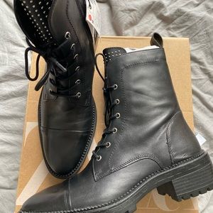 Studded low-heeled leather ankle boots